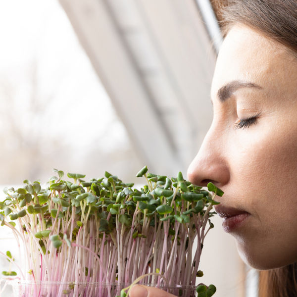 woman with microgreens